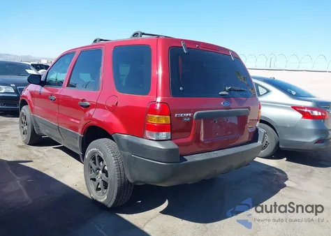 2003 Ford Escape Xls z USA, uszkodzony, nr VIN 1FMYU02193KB33177
